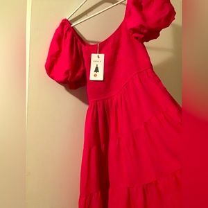 A Hot Pink Zessica dress with Zero stains and is brand new!